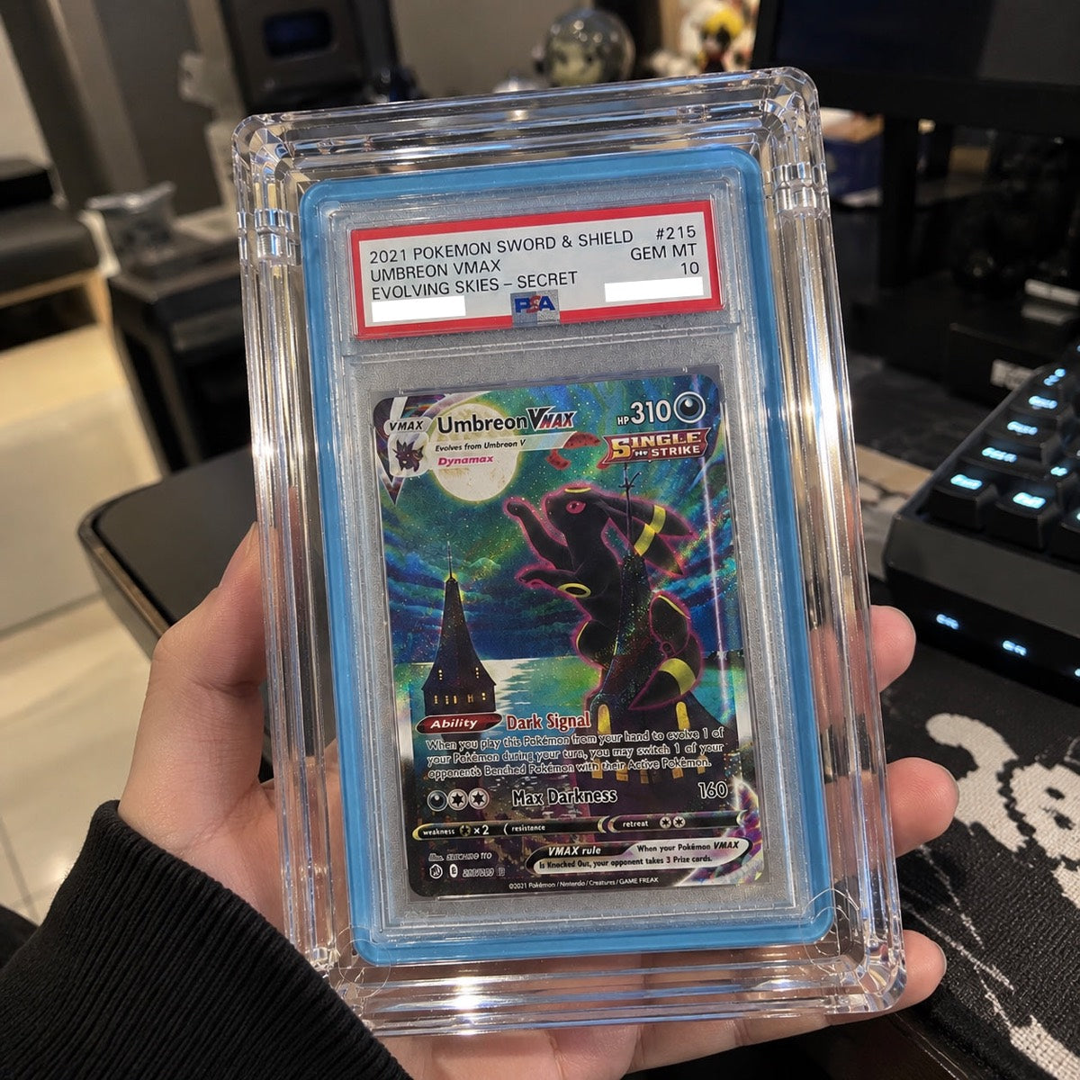A PSA 10 Umbreon VMAX slab in a GX Slab Display
